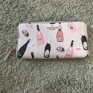 Pink champagne drinks Kate spade wallet